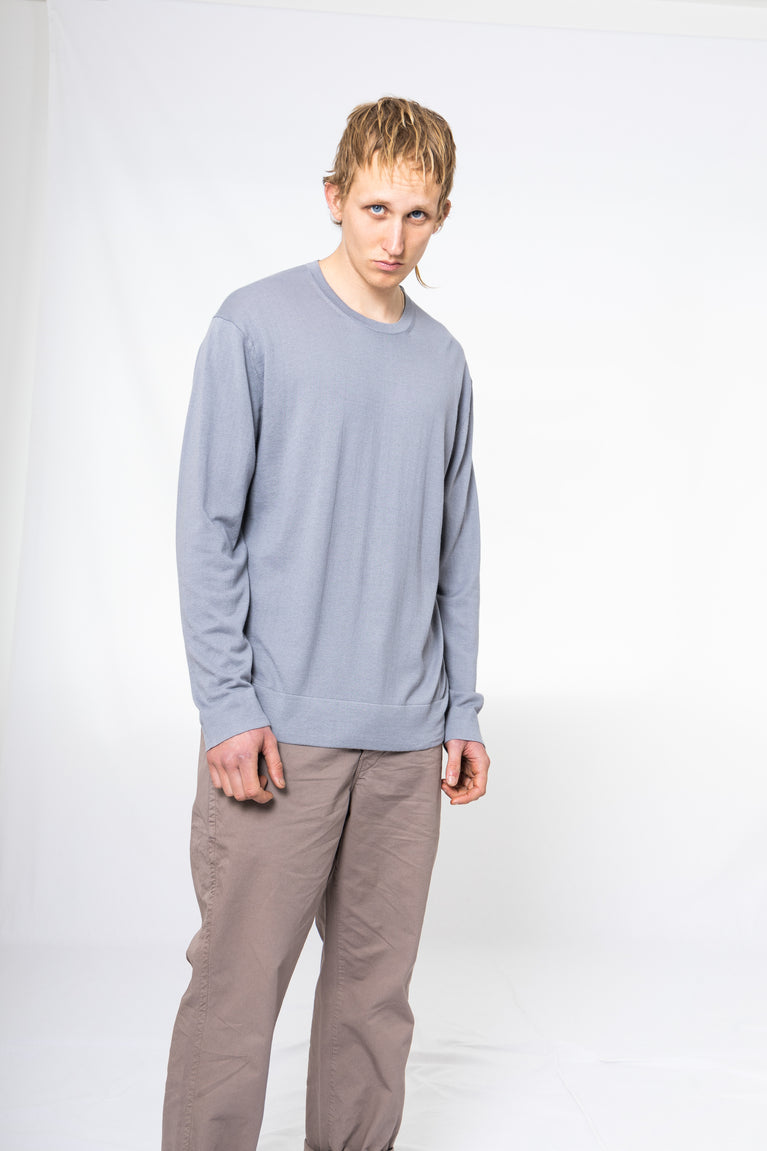 7d collection , 7d , belgian brand , ikkoopbelgisch , cotton lined coat with patch pockets in heavy wool v-neck sweater in supersoft merino rib knit regular fit five pocket pant in japanese colour denim